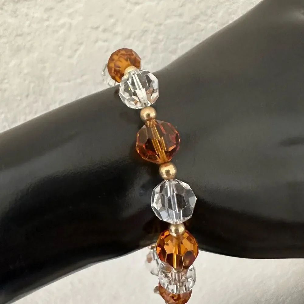 Orange and clear crystal beaded bracelet